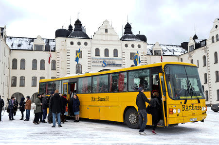 FiILE PHOTO: People participating in the class war safari observe buildings at the upper class district at Solsidan in Saltsjobaden near Stockholm, Sweden anuary 28, 2012. REUTERS/Anders Wiklund/Scanpix Sweden/File Photo THIS IMAGE HAS BEEN SUPPLIED BY A THIRD PARTY. NO COMMERCIAL OR BOOK SALES. SWEDEN OUT. NO THIRD PARTY SALES. NOT FOR USE BY REUTERS THIRD PARTY DISTRIBUTORS