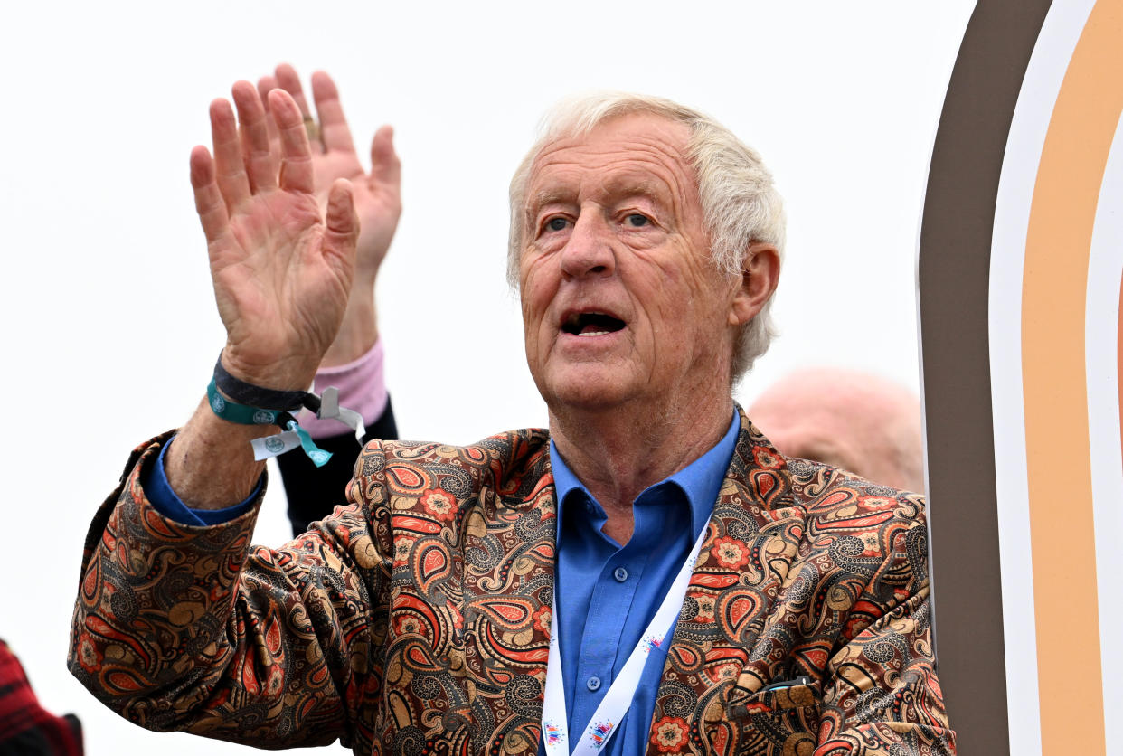 LONDON, ENGLAND - JUNE 05: Chris Tarrant rides a bus down the mall during the Platinum Pageant on June 05, 2022 in London, England. The Platinum Jubilee of Elizabeth II is being celebrated from June 2 to June 5, 2022, in the UK and Commonwealth to mark the 70th anniversary of the accession of Queen Elizabeth II on 6 February 1952.  (Photo by Leon Neal - WPA Pool/Getty Images)