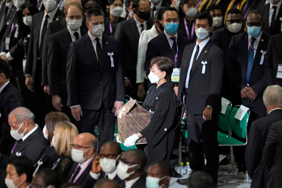 Akie Abe, widow of former prime minister of Japan Shinzo Abe, arrives with her husband’s remains (Getty Images)