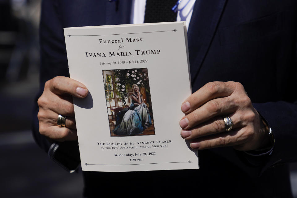 R. Couri Hay, longtime friend of Ivana Trump, holds a program from her funeral Mass, Wednesday, July 20, 2022, in New York. (AP Photo/John Minchillo)