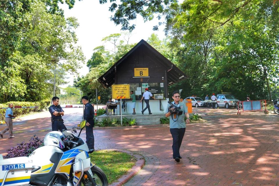 Members of media gather outside Gate B of Tun Mahathir's housing area in Seri Kembangan February 24, 2020. — Picture by Ahmad Zamzahuri