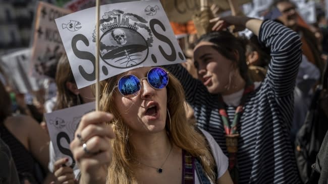 Students shout slogans during a rally in Madrid, Spain, on March 15, 2019. Students mobilized by word of mouth and social media skipped class to protest what they believe are their governments' failure to take tough action against global warming. | Students shout slogans during a rally in Madrid, Spain, on March 15, 2019. Students mobilized by word of mouth and social media skipped class to protest what they believe are their governments' failure to take tough action against global warming. | Bernat Armangue/AP