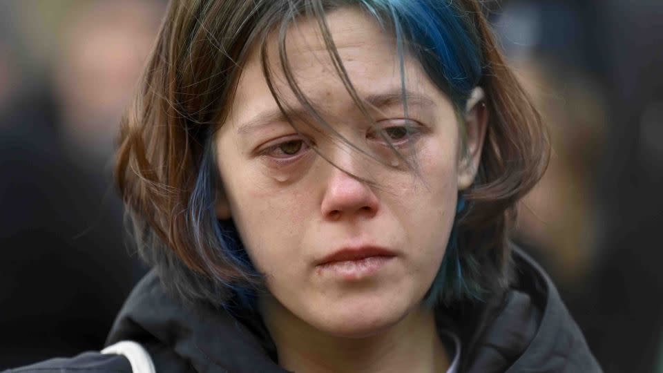 A woman cries outside the scene of the mass shooting. - Denes Erdos/AP