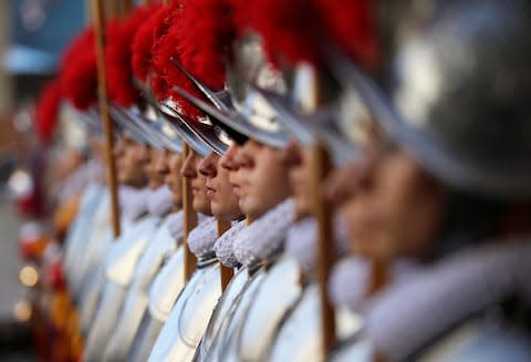 Swiss guards at the Vatican bustle for elbow room - Credit: REUTERS/MAX ROSSI