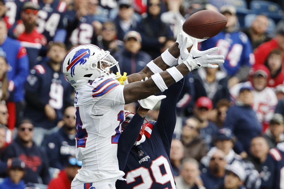 New England Patriots cornerback J.C. Jackson (29) blocks the ball on a pass to Buffalo Bills wide receiver Stefon Diggs (14) during the second half of an NFL football game, Sunday, Oct. 22, 2023, in Foxborough, Mass. (AP Photo/Winslow Townson)