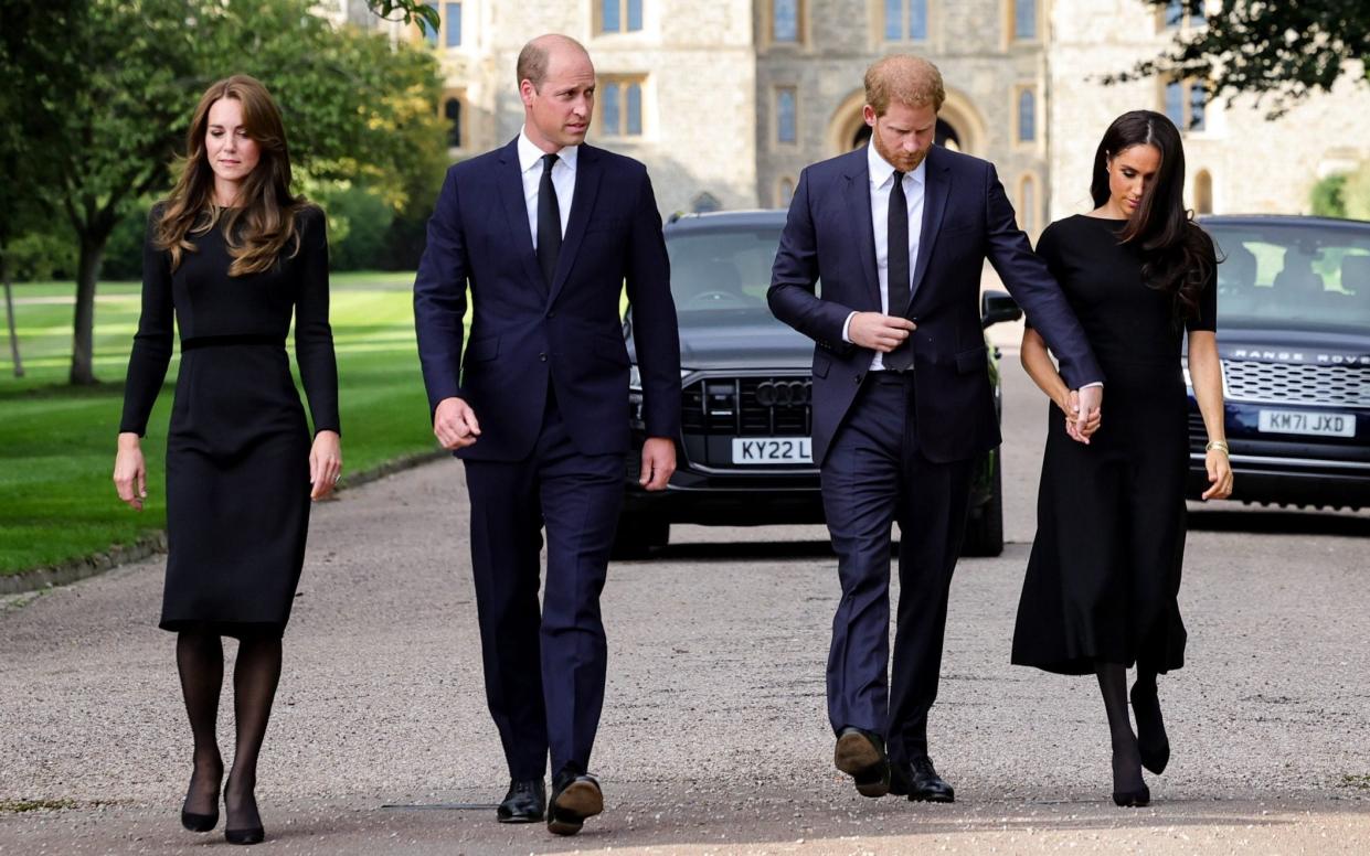 The Prince and Princess of Wales (left) and the Duke and Duchess of Sussex (right) on a walkabout to greet well-wishers in Windsor following the death of Queen Elizabeth II - Chris Jackson/Getty Images