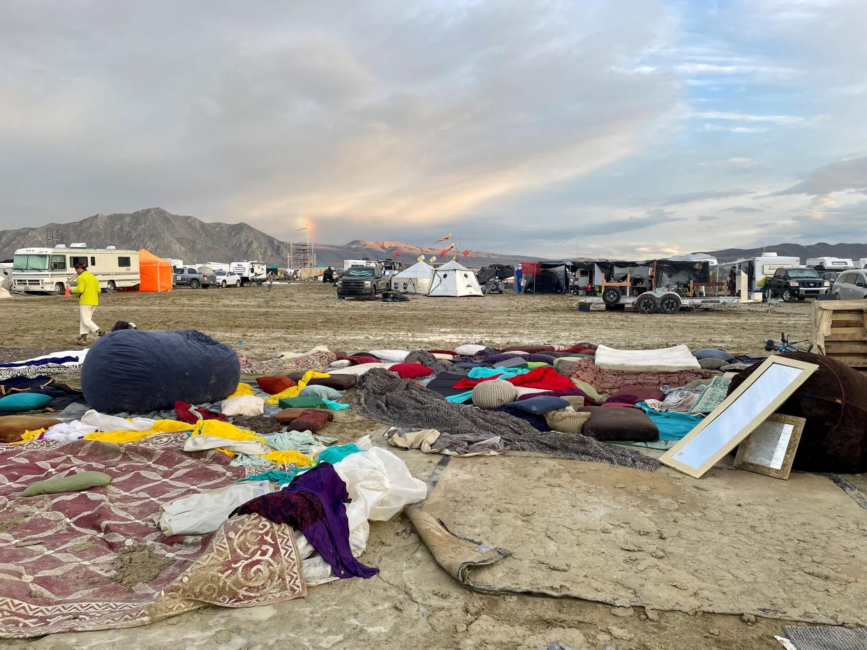 Muddy desert plain after heavy rains turned the annual Burning Man festival site in Nevada's Black Rock desert into a mud pit.