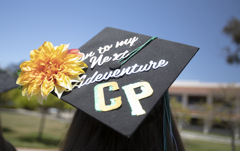 Jaycee McIntire’s hat shows she is going to Cal Poly. Cuesta College in San Luis Obispo held its graduation ceremony for the class of 2023 on Friday, May 19, 2023. A total of 1,207 students graduated from the community college.