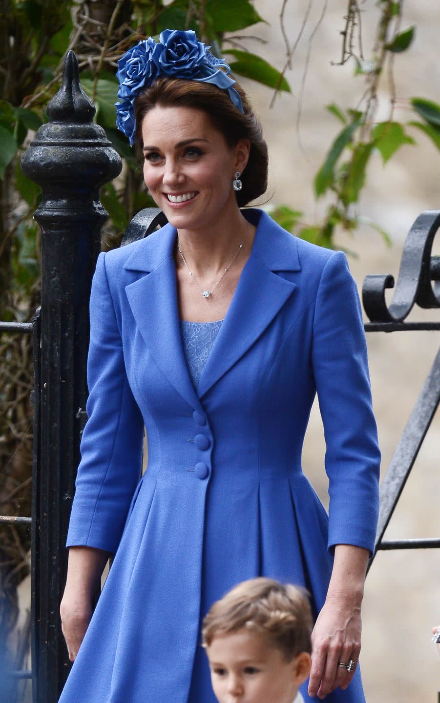 <p>Kate attended <a href="https://www.townandcountrymag.com/society/tradition/a23398732/prince-george-princess-charlotte-sophie-carter-wedding/" rel="nofollow noopener" target="_blank" data-ylk="slk:the wedding of her close friend;elm:context_link;itc:0;sec:content-canvas" class="link ">the wedding of her close friend</a>, Sophie Carter, wearing a bespoke royal blue coat and dress by Catherine Walker. <a href="https://www.townandcountrymag.com/society/tradition/g10314690/kate-middleton-fashion-royal-tour-2017/" rel="nofollow noopener" target="_blank" data-ylk="slk:The Duchess first wore this look;elm:context_link;itc:0;sec:content-canvas" class="link ">The Duchess first wore this look</a> while on a royal tour of Poland and Germany last year. </p>