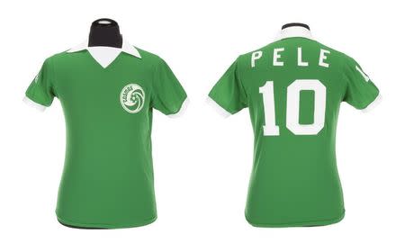 A green Umbro brand New York Cosmos football jersey number "10" worn by Pele during the 1976 North American Soccer League (NASL) season is shown in this handout image released on March 8, 2016. REUTERS/Julien's Auctions/Handout via Reuters