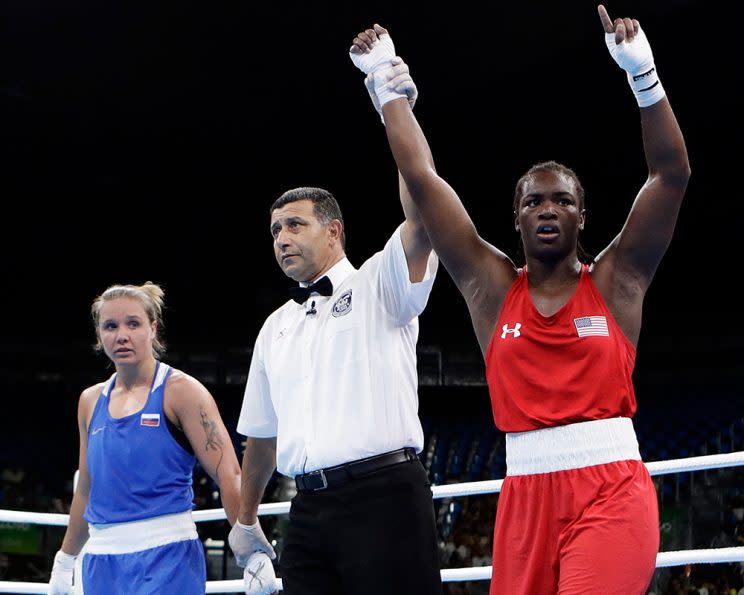 Claressa Shields (R) fights for her second straight Olympic gold on Sunday. (AP)