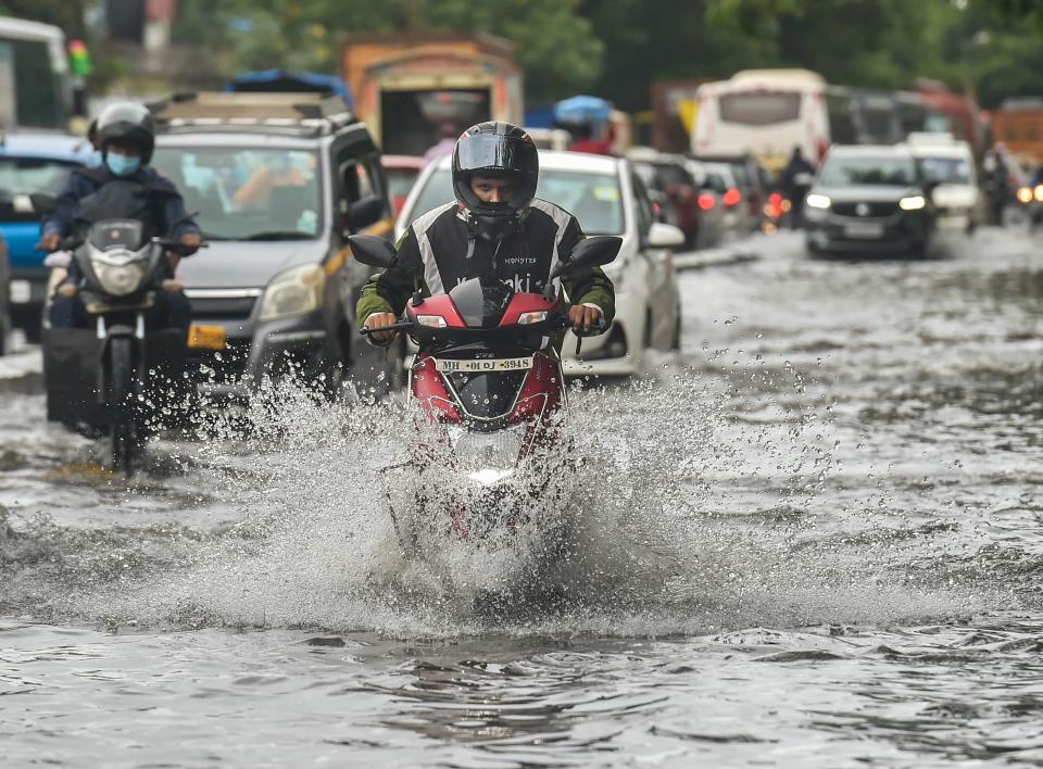 Mumbai: Vehicles move on a waterlogged street followed heavy rain, at Wadala in Mumbai, Wednesday, Sept. 23, 2020. (PTI Photo/Mitesh Bhuvad)(PTI23-09-2020_000092B)