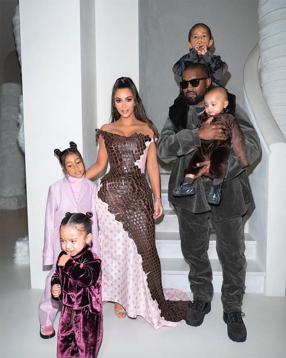 It looks like Chicago wasn't feeling the family photos, though she looked adorable in a purple velvet jumpsuit. 