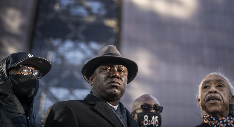 From left, Terrence Floyd, Ben Crump, Philonise Floyd, and Al Sharpton