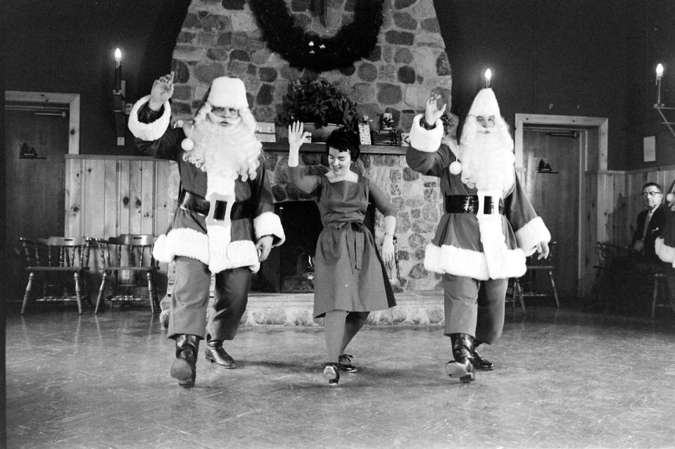 Dance instructor, “Miss Joy” Merkle, teaching prospective Santas how to dance and be jolly, an important attribute for all students, in 1961. (Alfred Eisenstaedt/The LIFE Picture Collection) 