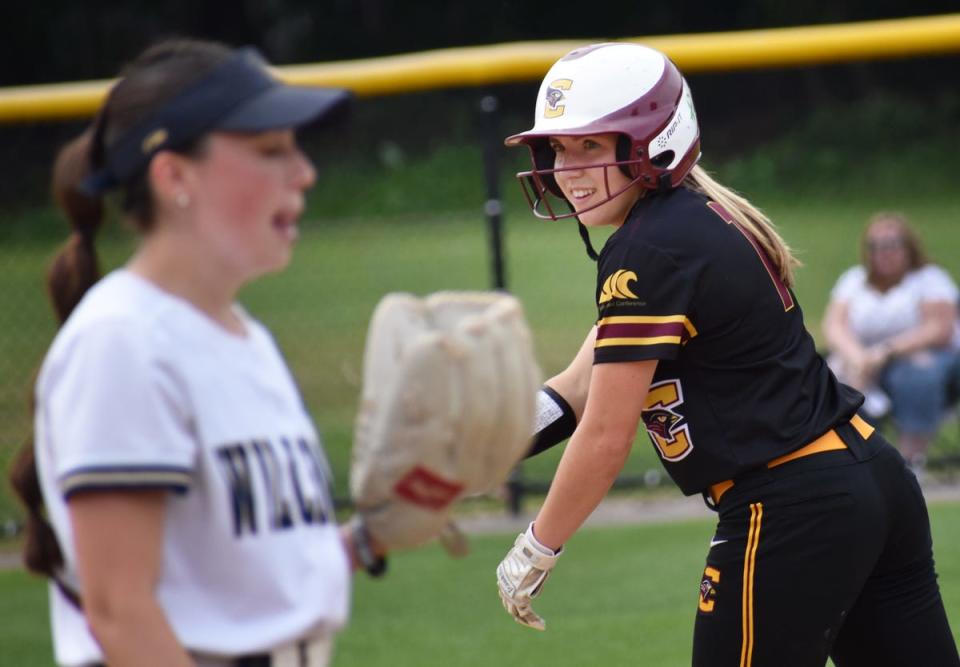 Case's Megan Smith smiles at second base after hitting a double in the first inning.