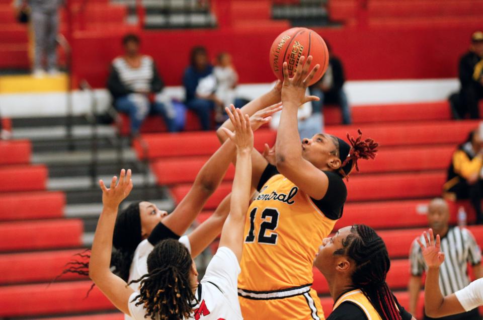 Central’s Destiny Jones makes a shot against Manual in the 25th District final on Thursday night.