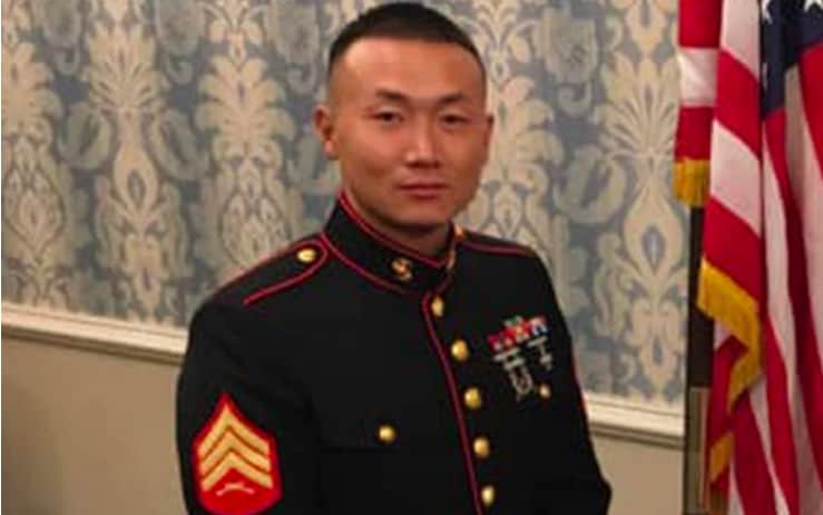Baimadajie Angwang, a community affairs liaison at the 111th Precinct in Queens and a member of the US Marine Corps Reserve, - NYC Police Benevolent Association / Facebook 