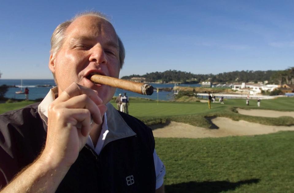 Rush Limbaugh puffs on a VSG cigar while golfing at Pebble Beach