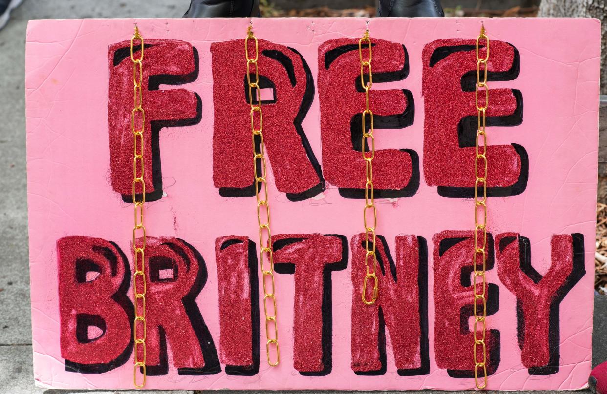 A placard is pictured in front of the courthouse during the FreeBritney movement rally in support of musician Britney Spears following a conservatorship court hearing in Los Angeles, California on April 27, 2021. - Britney Spears has requested to speak in court in the legal battle over her father's control of her affairs, her attorney said April 27, 2021. The 39-year-old US pop singer is the subject of a 