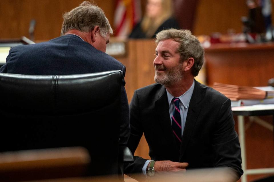 The defense team talks during the murder trial in which Jeremy Childress is accused of murdering Michelle Hester in Harrison County Court in Gulfport on Wednesday, June 21, 2023.