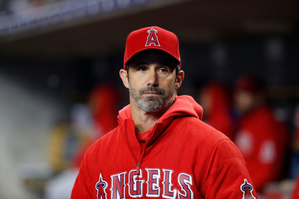 FILE - Los Angeles Angels manager Brad Ausmus watches in the sixth inning of a baseball game against the Detroit Tigers in Detroit, Tuesday, May 7, 2019. Former Tigers and Angels manager Brad Ausmus will be the new bench coach of the Oakland Athletics under first-year manager Mark Kotsay. The A's announced Kotsay's staff Friday, Jan. 14, 2022.  (AP Photo/Paul Sancya, File)