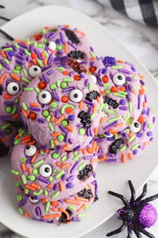 <p>Kimspired DIY</p><p><strong>Get the recipe: <a href="https://kimspireddiy.com/halloween-monster-cookies-best-monster-eye-cookie-recipe-easy-edible-sugar-cookie-monster-eyes-party-food-desserts-snacks/" rel="nofollow noopener" target="_blank" data-ylk="slk:Easy Halloween Monster Cookies;elm:context_link;itc:0;sec:content-canvas" class="link ">Easy Halloween Monster Cookies</a></strong></p>