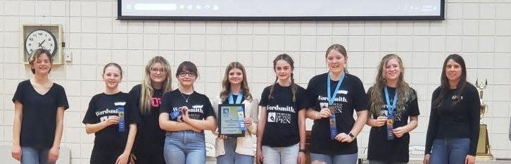 The seventh grade Rushville Middle School Power of the Pen Team earned first place.