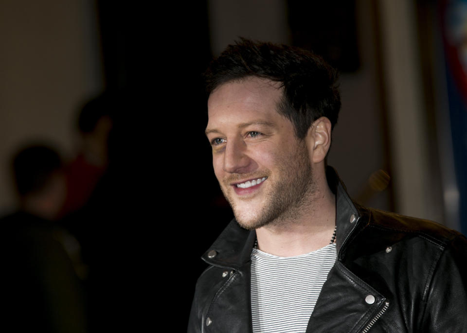 British musician Matt Cardle poses for photographers at the I Can't Sing Press Night, Wednesday, March 26, 2014 in London. I Can’t Sing! The X Factor Musical is a new musical comedy written by Harry Hill and produced by Simon Cowell. (Photo by John Phillips/Invision/AP Images)