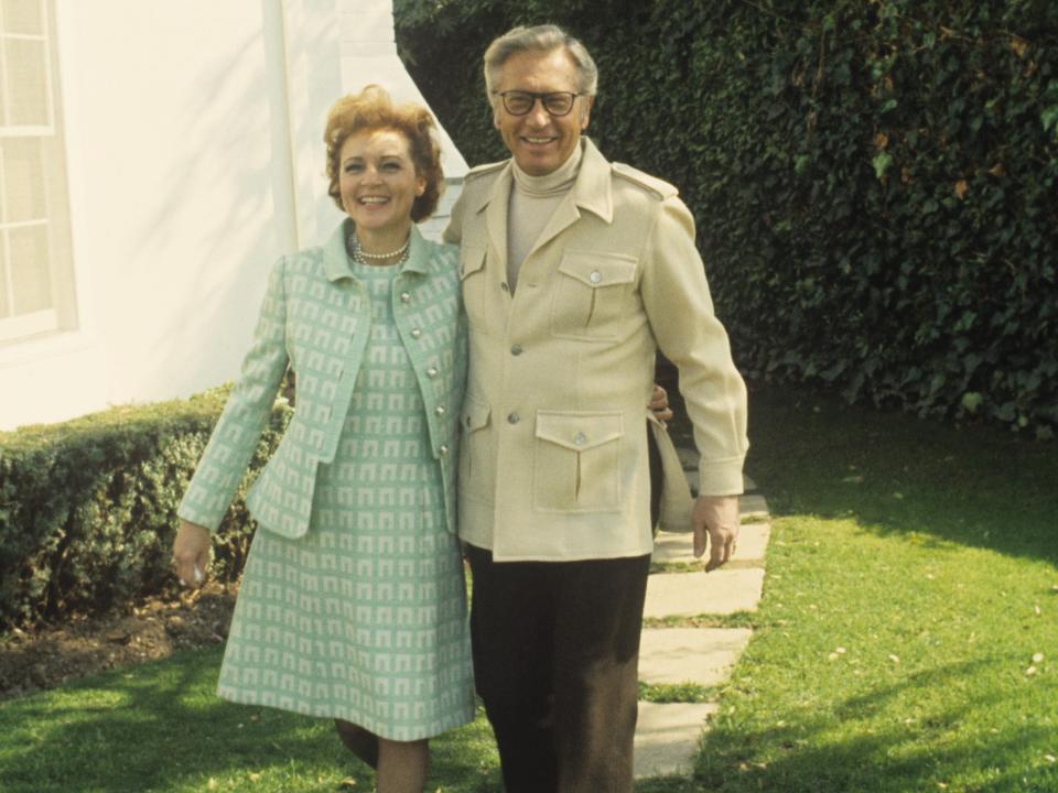 Betty White holding Allen Ludden