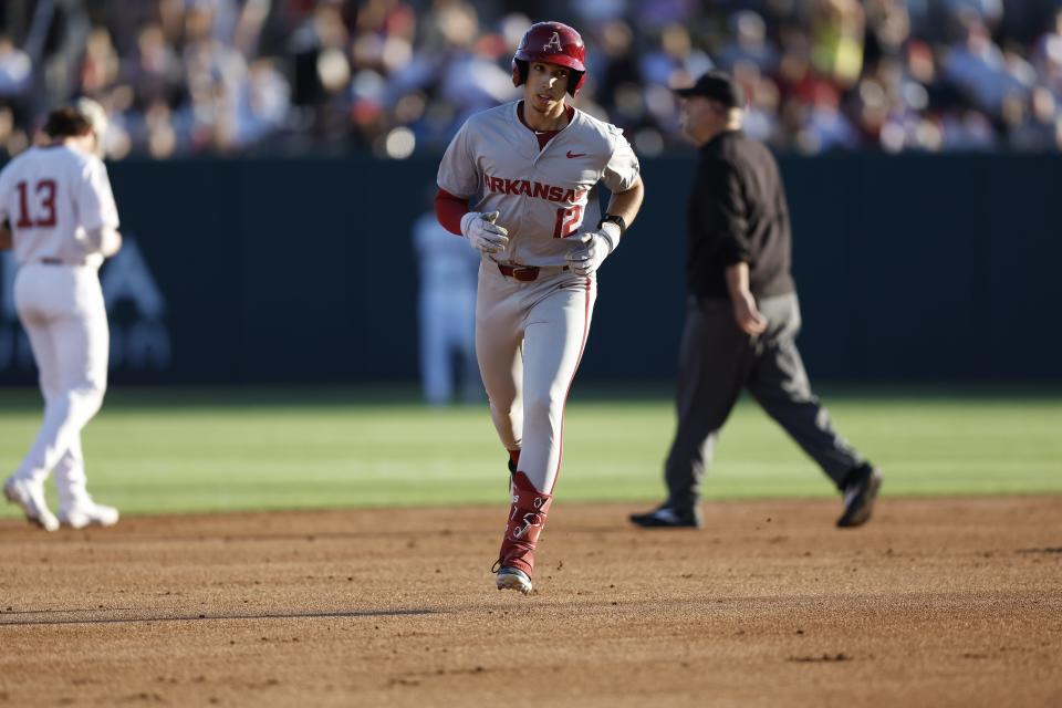 Jared Sprague-Lott heads toward third after hitting a home run in the first inning of Arkansas baseball's 5-3 victory over Alabama Friday, April 12, 2024.