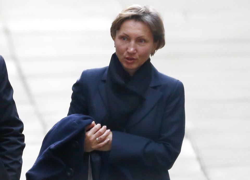 Marina Litvinenko, the widow of murdered KGB agent Alexander Litvinenko arrives at the High Court in central London February 2, 2015. Litvinenko is due to give evidence at the long-awaited public inquiry into the death of her husband, ex-KGB spy Alexander Litvinenko, who died after being poisoned with a rare radioactive isotope nine years ago in London. REUTERS/Andrew Winning (BRITAIN - Tags: POLITICS CRIME LAW)