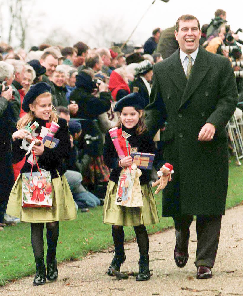 Princess Beatrice, Princess Eugenie and Prince Andrew at Christmas 1997 | UK Press via Getty