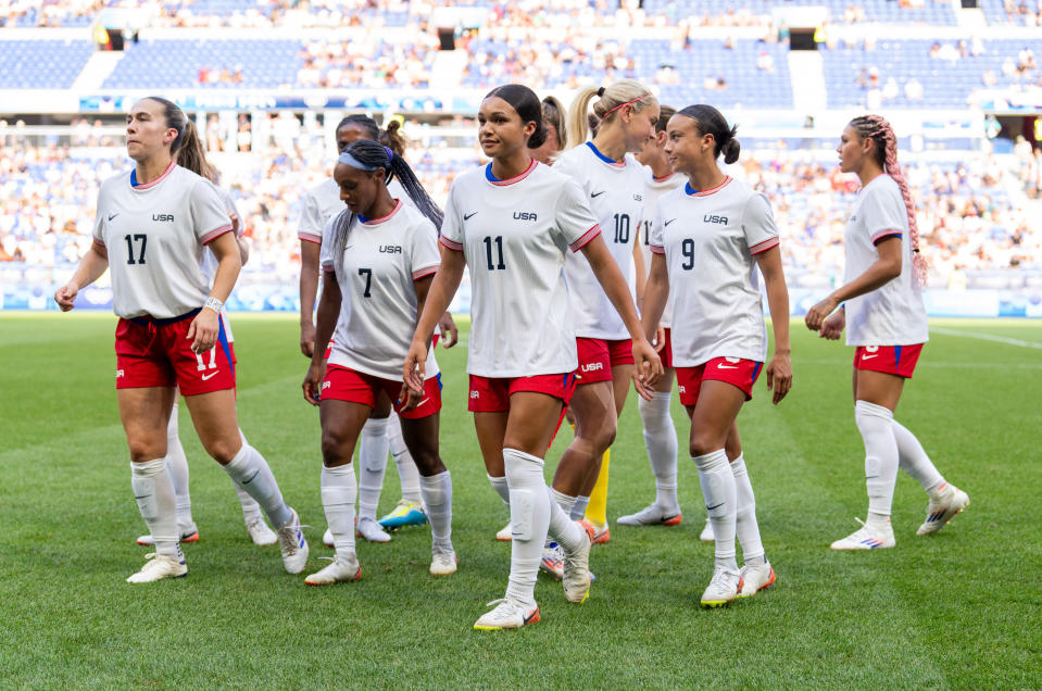 LYON, FRANCE - AUGUST 6: Sophia Smith #11 of the United States walks out of the starting XI photo before the Women's Semifinal match between Germany and the United States during the Olympic Games Paris 2024 at Stade de Lyon on August 6, 2024 in Lyon, France. (Photo by Brad Smith/ISI/Getty Images).