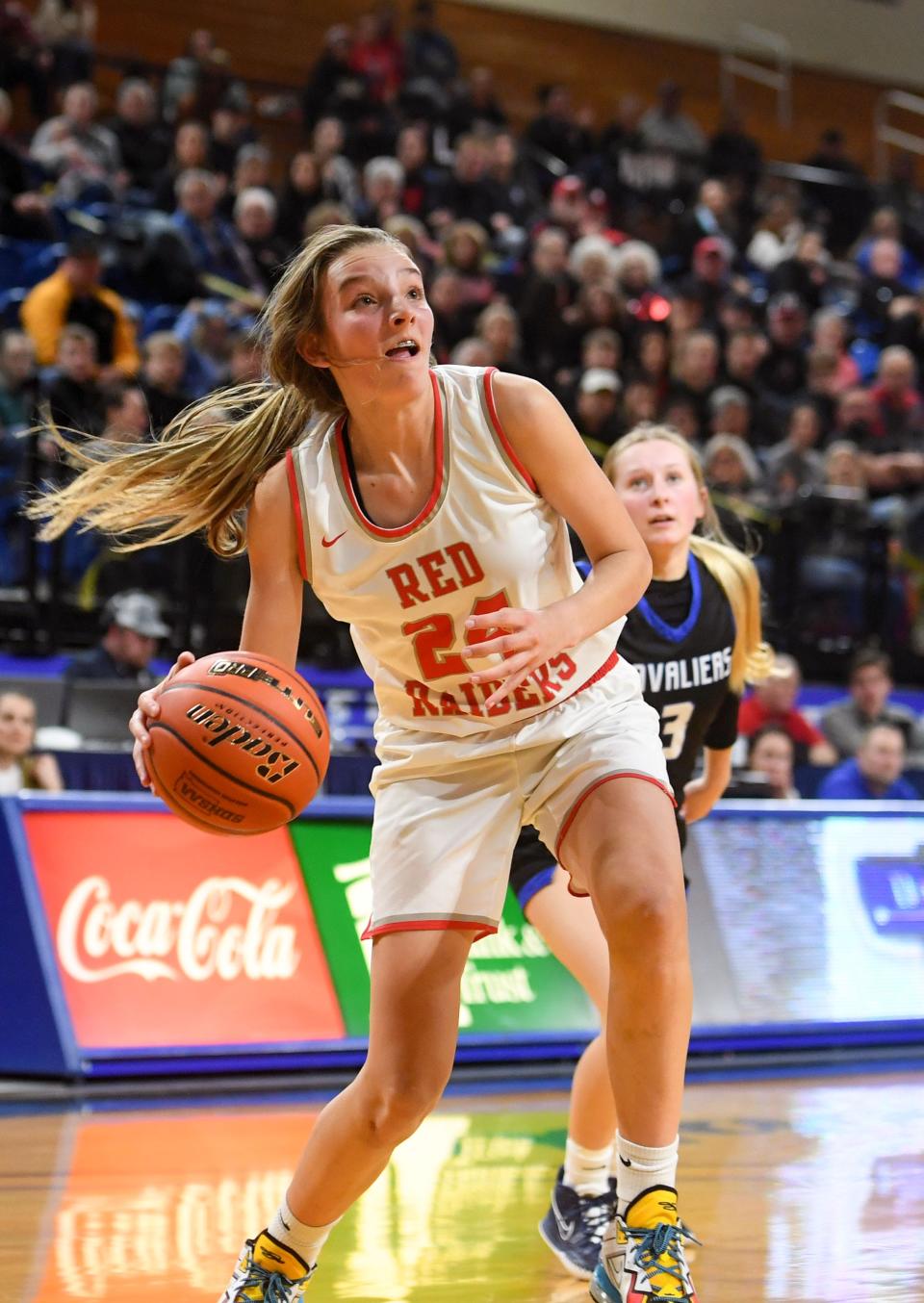 Wagner's Ashlyn Koupal dribbles toward the basket in a semifinal basketball game against St. Thomas More for the state Class A tournament on Friday, March 11, 2022, at Frost Arena in Brookings.