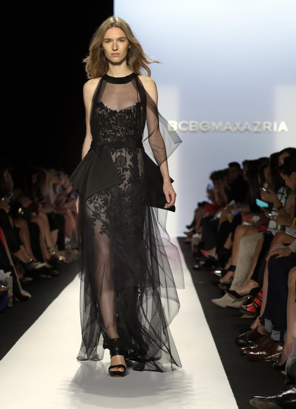 The BCBG MAX AZRIA Spring 2014 collection is modeled during Fashion Week in New York, Thursday, Sept. 5, 2013. (AP Photo/Richard Drew)