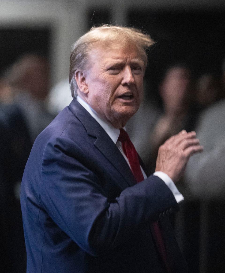 Former President Donald Trump walks from the courtroom at the Manhattan Criminal Courthouse on Feb. 15, 2024, after a procedural hearing ahead of his trial over a hush money payment to an adult film star before the 2016 election. During the hearing, the judge set the start of the trial for March 25th.