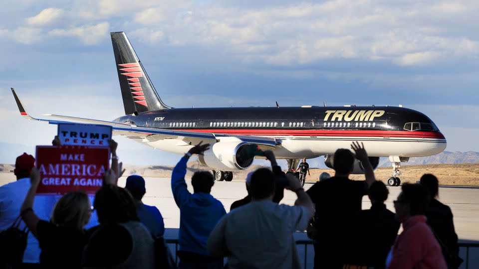 In Grand Junction, Colorado, supporters of then-candidate Donald Trump wave at his plane after a 2016 campaign rally. In 2019, President Trump moved the headquarters of the Bureau of Land Management to that city, leading 87 percent of affected employees to resign or retire rather than move from Washington, DC. - George Frey/Getty Images