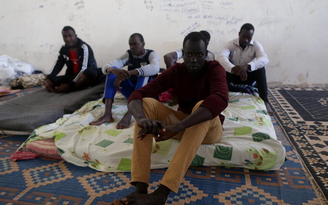 Migrants in a detention centre in Benghazi in eastern Libya  - REUTERS