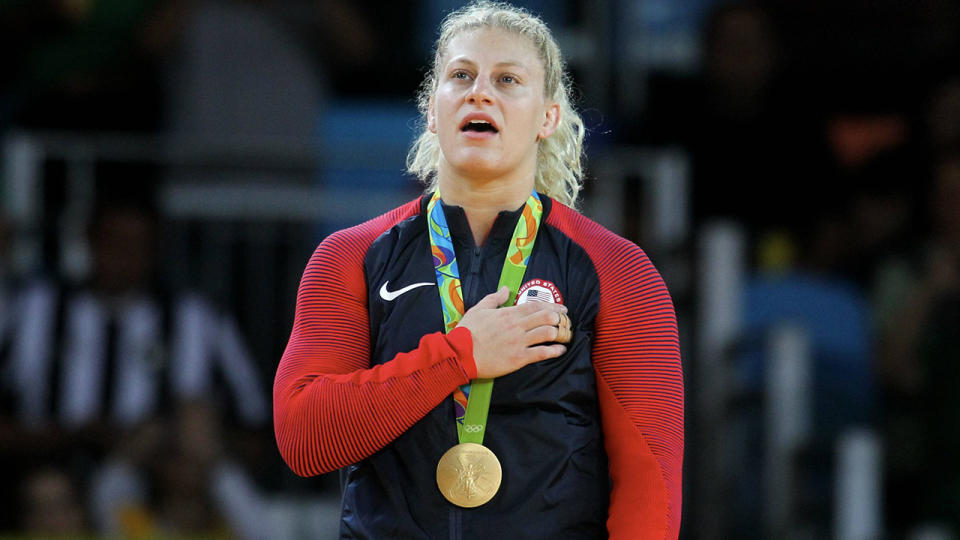 Kayla Harrison, pictured here celebrating her gold medal at the 2016 Olympics.