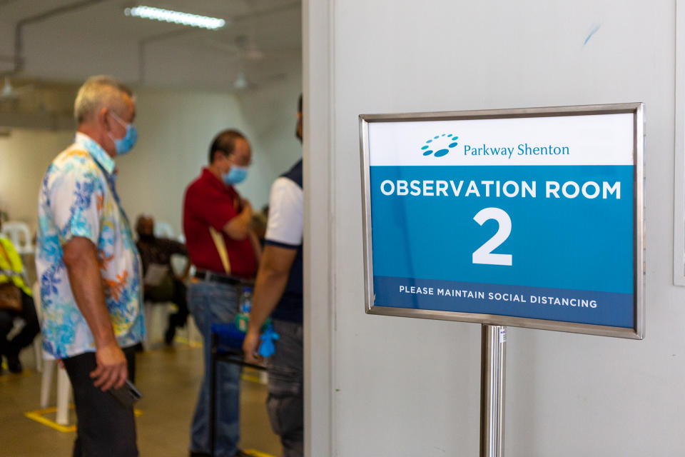 People seen queueing at a vaccination centre in Jurong West on 23 February 2021. (PHOTO: Dhany Osman / Yahoo News Singapore)