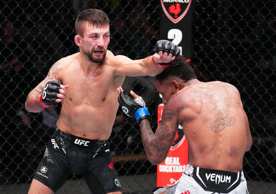 LAS VEGAS, NEVADA – NOVEMBER 18: (L-R) Chad Anheliger of Canada punches Jose Johnson in a bantamweight fight during the UFC Fight Night event at UFC APEX on November 18, 2023 in Las Vegas, Nevada. (Photo by Chris Unger/Zuffa LLC via Getty Images)