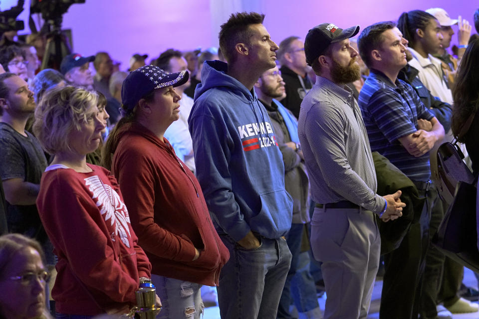 Voters listen to Independent presidential candidate Robert F. Kennedy Jr. speak during a voter rally, Wednesday, Dec. 20, 2023, in Phoenix. (AP Photo/Matt York)