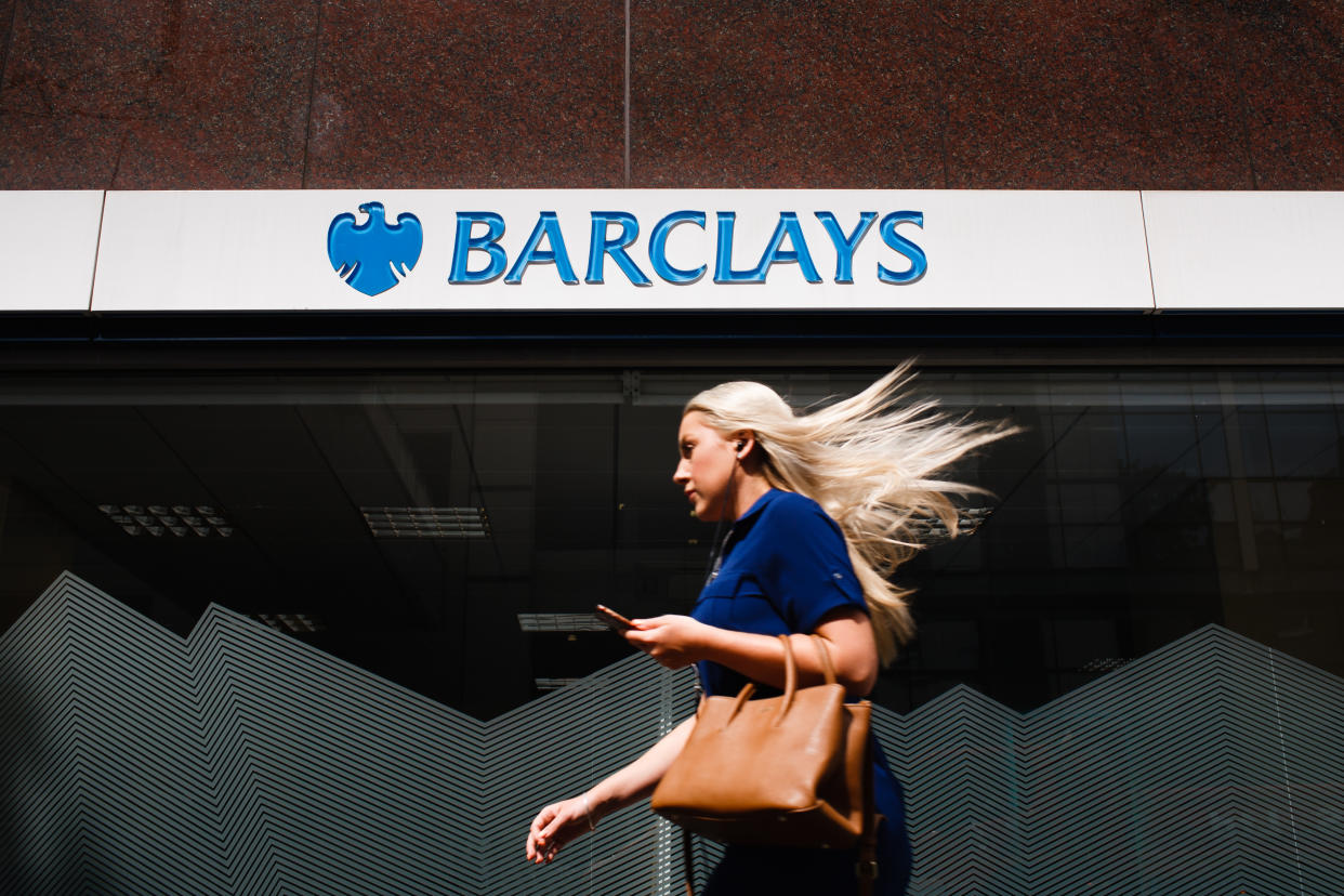 A woman walks past a branch of Barclays bank on Wormwood Street in London, England, on July 26, 2019. Four major UK banks, including Barclays, are set to release interim figures over the coming days. Half-year results for Lloyds Banking Group are due out on July 31, for Barclays on August 1, for the Royal Bank of Scotland (RBS) on August 2 and for HSBC on August 5. (Photo by David Cliff/NurPhoto via Getty Images)