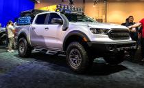 <p>The <a href="https://www.caranddriver.com/news/a29431646/ford-2019-sema-ranger-transit/" rel="nofollow noopener" target="_blank" data-ylk="slk:RTR Rambler Ford Ranger;elm:context_link;itc:0;sec:content-canvas" class="link ">RTR Rambler Ford Ranger</a> does everything right without going too far. Ford chose 33-inch Nitto Ridge Grappler tires with custom RTR Tech 6 wheels, because they know anything bigger than that will be unnecessary in most cases. Three LED light bars are tastefully tucked into a custom front grille to complete an almost <a href="https://www.caranddriver.com/ford/ranger-raptor" rel="nofollow noopener" target="_blank" data-ylk="slk:Ranger Raptor;elm:context_link;itc:0;sec:content-canvas" class="link ">Ranger Raptor</a>–like appearance. A two-inch suspension lift is installed as well as heavy-duty rock sliders, which act as both a step and as extra protection against rocky terrain. It's a simple package done well, saving the flashy stuff like wild paint for the Insta-campers. </p>