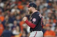 Washington Nationals' Sean Doolittle celebrates after Game 1 of the baseball World Series against the Houston Astros Tuesday, Oct. 22, 2019, in Houston. The Nationals won 5-4 to take a 1-0 lead in the series. (AP Photo/David J. Phillip)