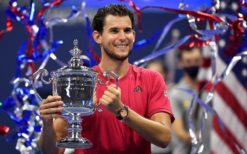 Dominic Thiem of Austria celebrates with the championship trophy after his match against Alexander Zverev of Germany (not pictured) in the men's singles final match on day fourteen of the 2020 U.S. Open tennis tournament at USTA Billie Jean King National Tennis Center.  - Danielle Parhizkaran-USA TODAY Sports