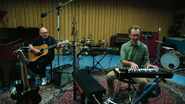 <p>Apple TV+</p> Composer Gary Clark and director John Carney behind the scenes of "Flora and Son"