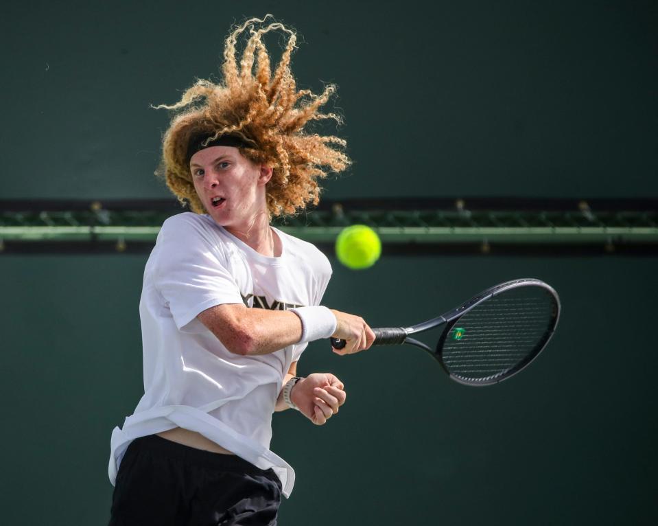 Xavier's Kiefer Brown hits to Xavier's Caleb Kassinove during the boys' DEL tennis finals in Indian Wells, Calif., Thursday, April 25, 2024.