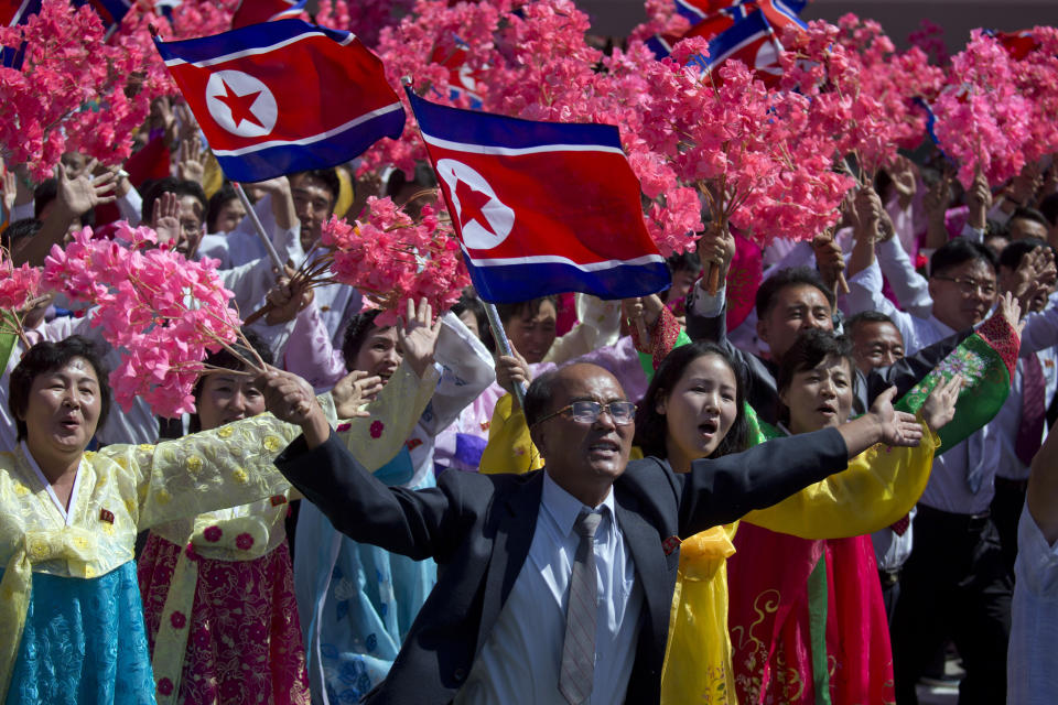 Participants cheer during a parade marking the 70th anniversary of North Korea's founding day in Pyongyang, North Korea, Sunday, Sept. 9, 2018. North Korea staged a major military parade, huge rallies and will revive its iconic mass games on Sunday to mark its 70th anniversary as a nation. (AP Photo/Ng Han Guan)